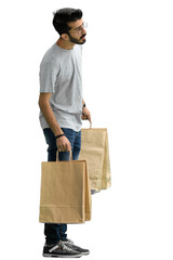 Man, on a green background, full-length, with bags