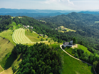 Aerial View of Sveti Jakob Hill with a Church on Top. Slovenia, Europe - 767393849