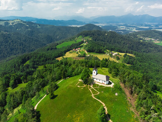 Aerial View of Sveti Jakob Hill with a Church on Top. Slovenia, Europe - 767393851
