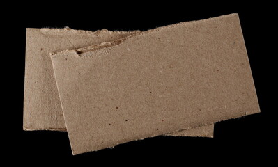 Cardboard scraps isolated on black background and texture - 767396239