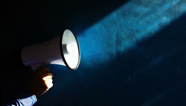 Amplifying Messages: Hand Holding Megaphone for Announcement