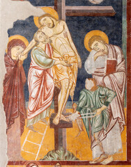 MILAN, ITALY - MARCH 7, 2024: The medieval fresco of Deposition in the church Basilica di Sn Lorenzo Maggiore by unknown artist. 