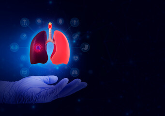 Concept of lung cancer and development of new technologies in medicine. The doctor's hand holds the...
