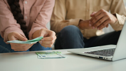 Unrecognizable woman man counting euro distribute money cash salary finances planning family budget...