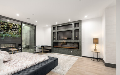 Fototapeta premium Bedroom with a cozy bed and a fireplace in the corner