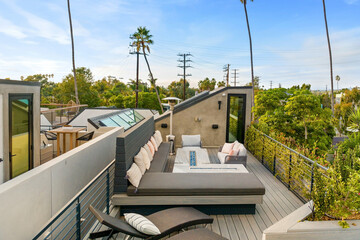 Fototapeta premium Comfortable outdoor balcony with stylish furniture