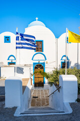 Entrance steps to beautiful Greek church in Adamas village port, Milos island, Cyclades, Greece - 767422829