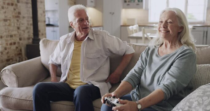 Back pain, old couple and man lose in video game competition, upset and angry man frustrated with gaming fail. Arthritis, spine problem and husband unhappy with defeat in gamer challenge on home sofa