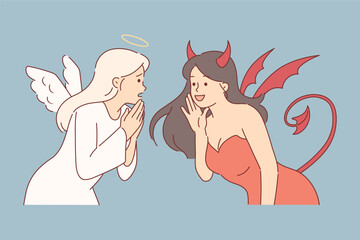 Women dressed as angel and devil for halloween party, discussing latest news together