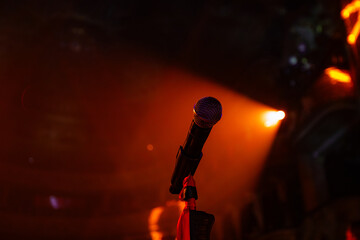 microphone on the empty stage with spotlights