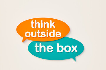 Think outside the box, chat bubble in orange, blue colors. Dreaming, inspiration, motto, thinking, respect, intelligence, variation, contrast, abstract, individuality. 3D illustration