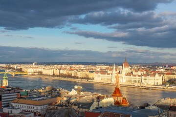 Aerial view on Parliament building, Danube River and City at sunset in Budapest, Hungary. High...