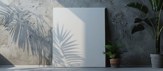 A white blank canvas is displayed leaning against a gray wall, serving as a mock-up poster frame and canvas template.