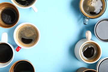 Many cups of hot coffee on blue background - obrazy, fototapety, plakaty