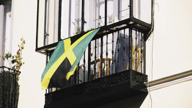 MADRID, SPAIN - DECAMBER 3 2017: flag of Jamaica was adopted on 6 August 1962, Jamaican Independence Day, country having gained independence from British-protected Federation of the West Indies.