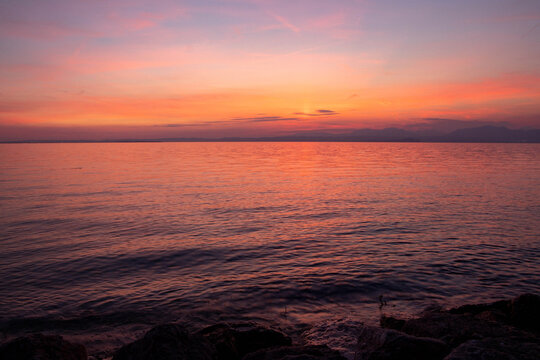 Lakeview at sunset from walkway at Cisano, Bardolino, Lake Garda, Italy