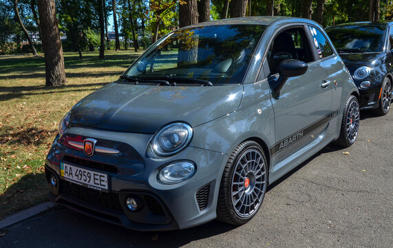 Grey Abarth 595 two-door, front-wheel-drive saloon produced by Italian automaker Fiat parked at the city 