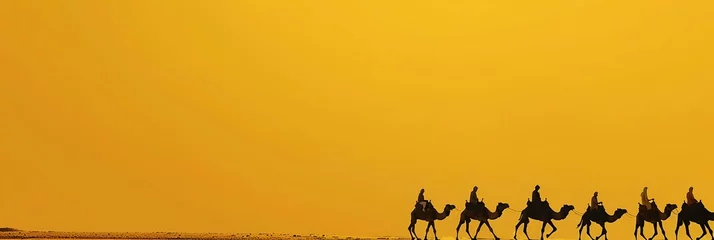 Foto op Plexiglas Caravan of camels in the desert. © inspiretta
