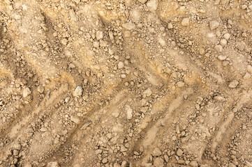 Field Traces: Texture of Tractor Tracks on the Ground.