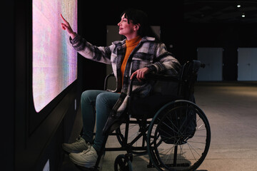 Woman Engaging with Futuristic Touchscreen Panel