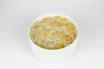 corn flakes in white cup