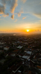 Orange Sky and Clouds Before Sunset Yogyakarta City Indonesia. Selective focus and blurry image