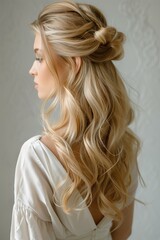 Obraz premium Wedding hairstyle. Blonde woman with long curly hair.