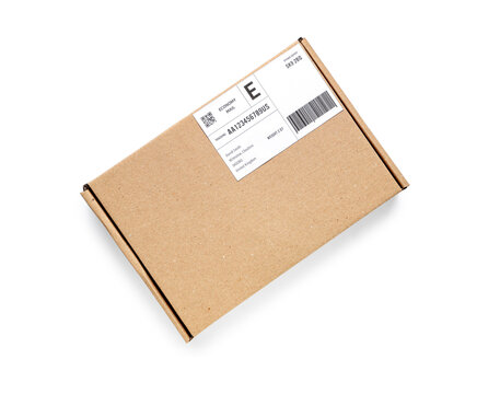 Cardboard packages with shipping label and barcode on white background