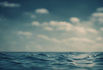 Obraz premium Immerse in Coastal Beauty: Deep Blue Sea Texture with a Sunny Sky and Fluffy Clouds, Inviting You to Relax and Enjoy Nature's Majesty