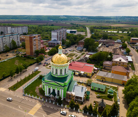 Scenic aerial view of Holy Trinity Church in Russian town of Ozyory in summer day..