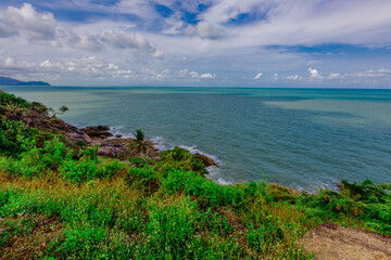  the background of the natural attractions of Khanom Sea, Ao Talet Wooden Bridgelk, you can walk out to admire the beautiful panoramic view of the sea. The sea has a bright blue color in the summer.