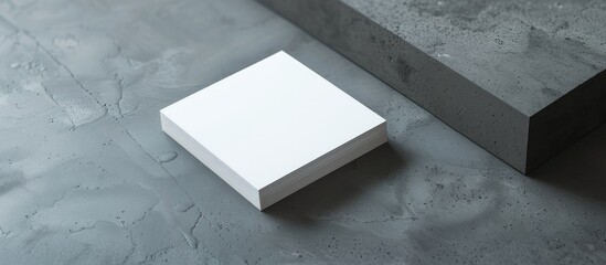 Business card with no information on a gray backdrop