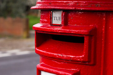 British post box in London, England, UK, selective focus.