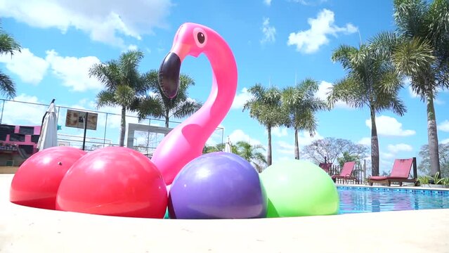 colored balls and buoys inside the pool