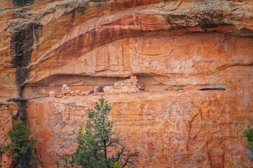 This close-up captures the incredible detail and vibrant color of an ancient cliff dwelling carved...