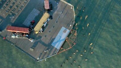 Aerial drone footage of Hastings pier in East Sussex, England