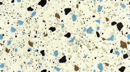  a close up of a counter top with blue, brown, and black speckles on a white background.