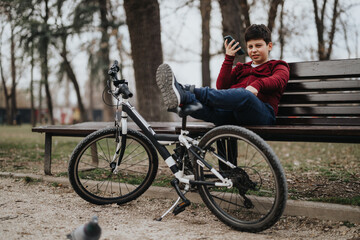 Casual day of leisure, individual relaxes on a park bench with a bike by their side, enjoying the outdoor serenity