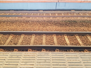 two railroad tracks inside the station