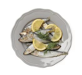  Fresh raw sprats, dill and cut lemon isolated on white, top view © New Africa