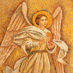 MILAN, ITALY - MARCH 4, 2024: The detial of mosaic of angel with the book in the church Chiesa di San Agostino from 20. cent.