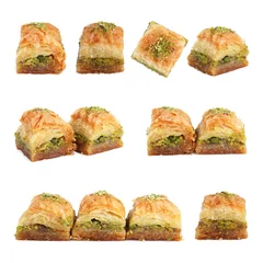  Eastern sweets. Pieces of delicious fresh baklava with chopped nuts isolated on white, set © New Africa