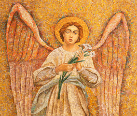 MILAN, ITALY - MARCH 4, 2024: The detial of mosaic of angel with the flower in the church Chiesa di San Agostino from 20. cent.