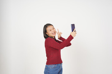 Young Asian woman in Red t-shirt Take a Selfie photo isolated on white background