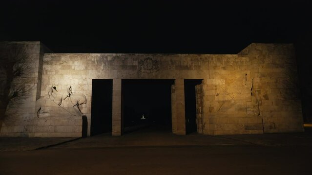 cemetery entrance: rigas bralu kapi dark stone monument with mother latvia monument