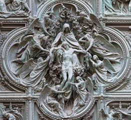 Fotobehang MILAN, ITALY - SEPTEMBER 16, 2024: The detail from main bronze gate of the Cathedral -   Deposition (Pieta) by Ludovico Pogliaghi (1906). © Renáta Sedmáková