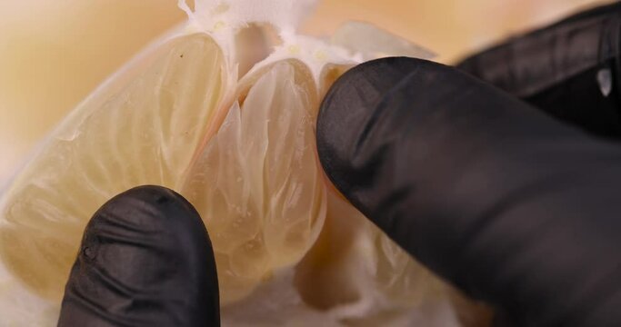 Chunks of ripe pomelo close-up, fresh fruit pomelo ready to eat