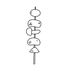 A skewer with various shapes of food on it