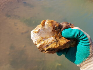 Transparent quartz in flint rock found in nature, field photo, rockhounding