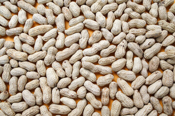 Food background of peanuts. Peanut in a shell texture. 